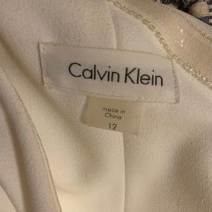 One shoulder white pantsuit with cape